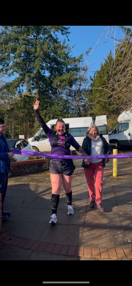 Hollie Prowse (left) and her mother crossing the finish line upon completing the challenge (Picture: Hollie Prowse)