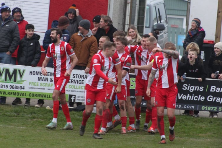Newquay celebrate scoring against Liskeard Athletic on Saturday.