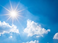 Sunny skies with light wind today and warmer tomorrow