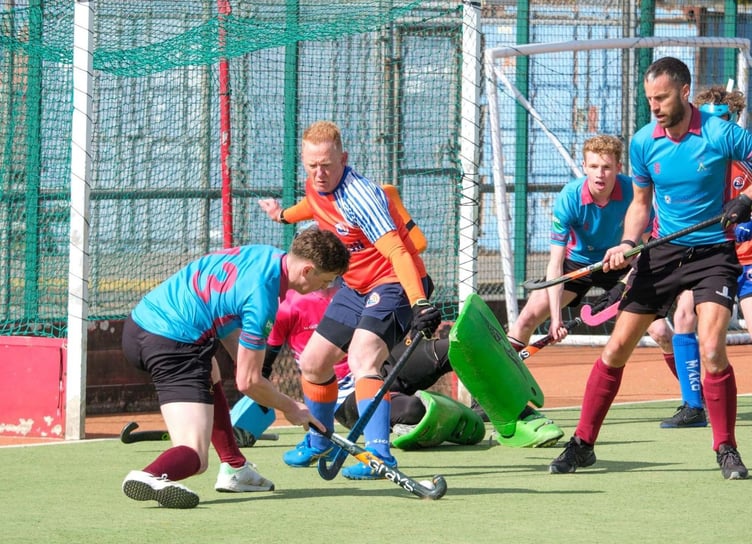 Kristof Saunders (far right) provided the cross for Bude's third goal.