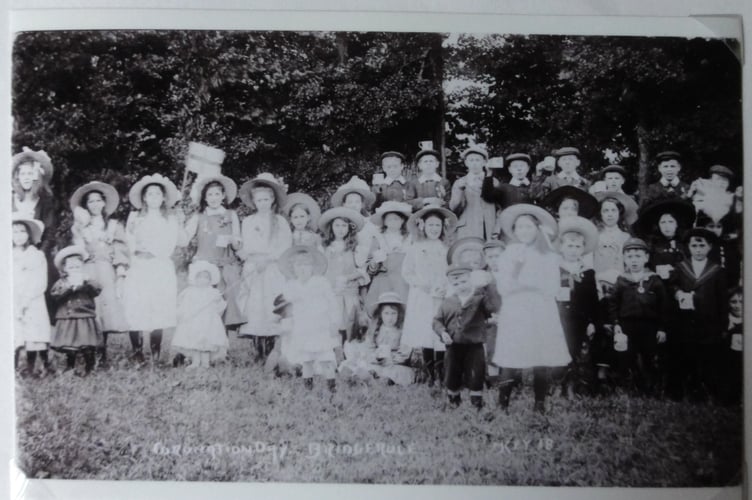 The Post is grateful to Rose Hitchings of Bridgerule for supplying this photograph of Bridgerule villagers celebrating the coronation of George V in 1911. She said: "The crowd scene is of children having been presented with their Coronation mugs - there's always a comedian in every village - one child at the back has his mug balanced on his head."