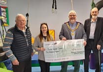 Freemasons in Cornwall make donation to neuro therapy centre