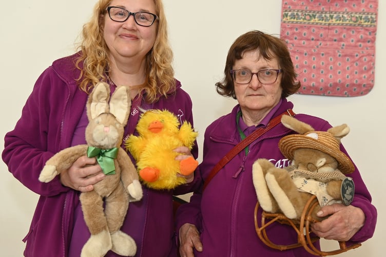 Abby and Lindsay with some of the Easter items on offer at the Launceston Cats Protection League Easter Fayre. (Picture: Adrian Jasper)
