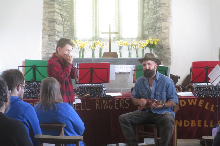 Sebastian Parsons, a local 12 year old, played harmonica accompanied by his father Robin on ukulele in Tremaine Church