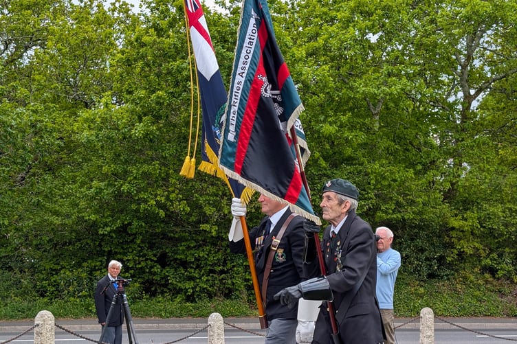 Two of the standard bearers present at the event march back into the Bodmin Keep at the end of their service. (Picture: Aaron Greenaway/Tindle)