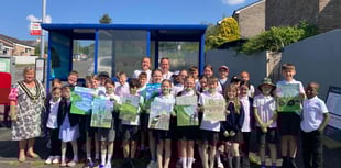 Students transform bus shelter with art