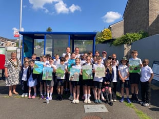 Students transform bus shelter with art