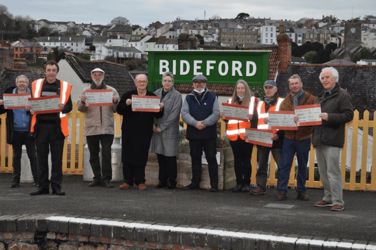 How it all began: Tim (second from left) in December 2021 when Railfuture’s Roger Blake (third from left) and West Devon’s Cllr Kev Ball (first left) - a member of the successful OkeRail campaign - met Mayor of Bideford David Ratcliff (fourth left), local councillor Peter Christie (first right) and Bideford Railway Heritage Centre volunteers for early discussions about restoring Bideford’s mainline rail services (Picture:Rob Dark, BRHC)
