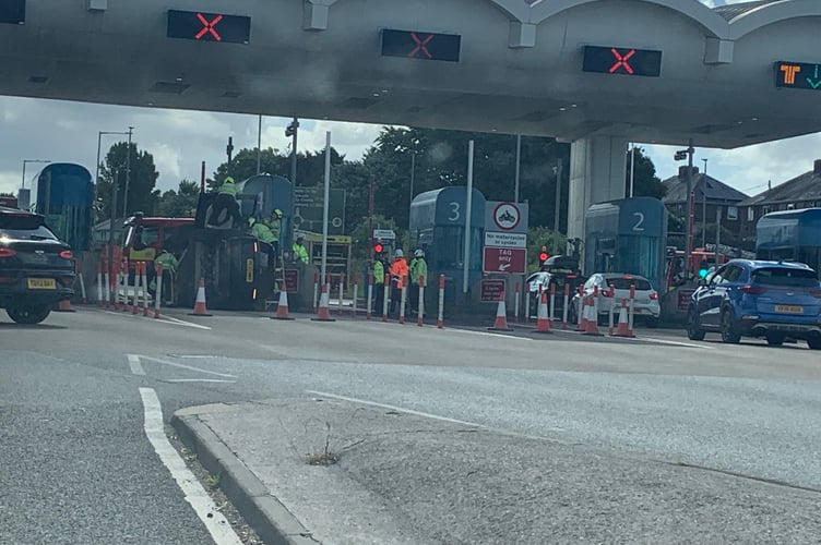 Emergency Services were called to the Tamar Bridge to deal with a single-vehicle collision by one of the toll booths