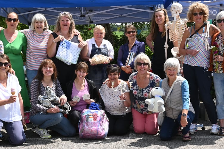 The team of the Stratton Hospital League of Friends and staff members ready with a warm welcome at their annual summer fete