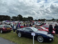 Thousands brave the rain to attend popular car show