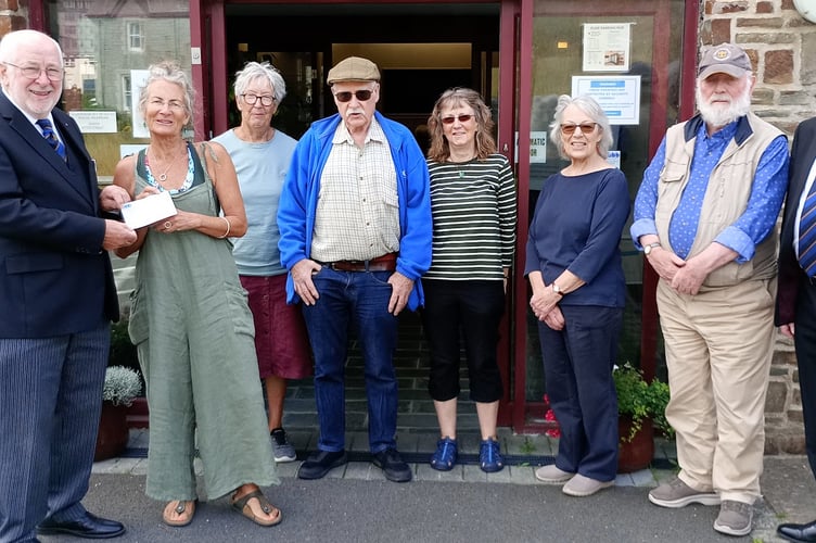 Bude Freemasons of Granville Lodge have been fund raising for the Berries Community Cafe and members were delighted to be able to present a cheque to the trustees and the Neetside manager, Miranda Clarke