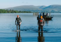 Olympian Hector Pardoe swims across UK's largest lakes, sets new record