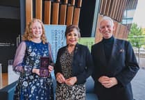 Calstock musician presented with  King's harpist brooch for harp excellence