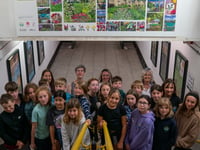 Schoolchildren unveil blossom inspired artwork at station