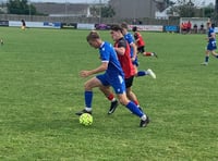 Woodland's late header earns Bude third straight victory