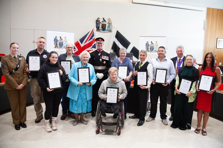 Lord Lieutenant of Cornwall, Colonel Sir Edward Bolitho KCVO OBE, alongside Cornwall Council Chairman Cllr Rob Nolan with representatives from the ten Cornish voluntary groups that have been honoured with nominations for the 2025 King’s Award for Voluntary Service 
