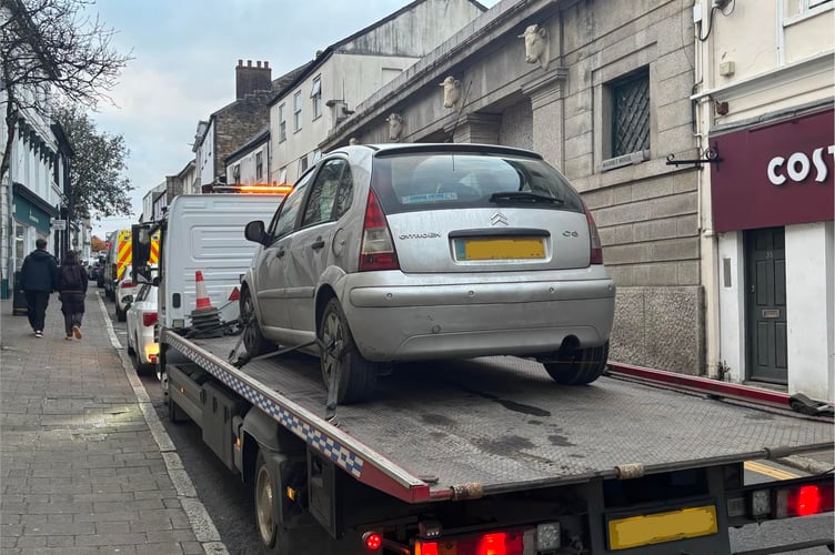 The seized vehicle on Fore Street in Bodmin (Picture: Devon and Cornwall Police)