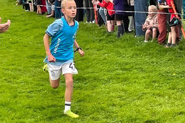 Jack Saunderson from Antony on his way to winning the Year 3/4 Boys race