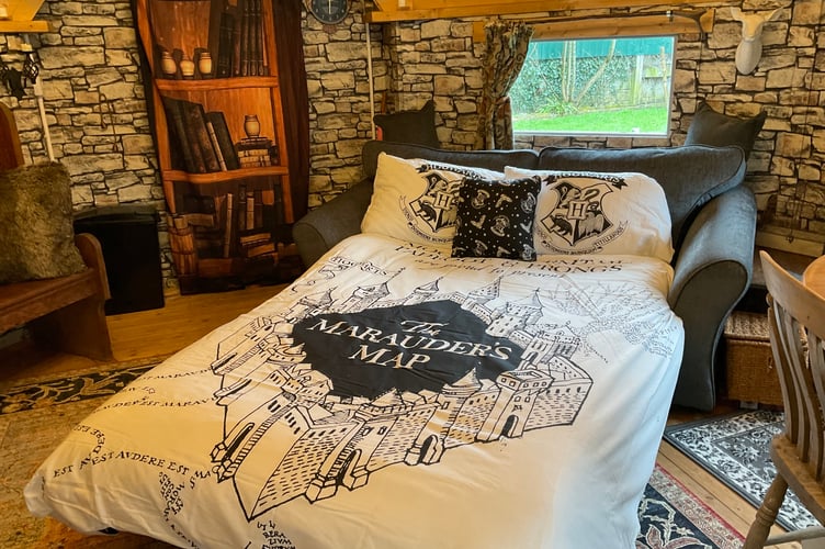 The Wizards Cauldron, located in the Cornish countryside. A couple has built a Harry Potter Airbnb - near the shooting location of the new TV series.The Wizards Cauldron, located in the Cornish countryside has been set up by husband and wife Stewart, 63, and Lucy Farmer, 61. The couple who moved from Kent three years ago dreamt of building an original Airbnb that would display their love for the movies.The living room is set out as Hagrid's Hut - with stone wallpaper, a fireplace, a pumpkin patch and a variety of magical creatures.