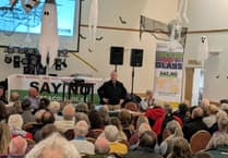 Rallying cries in packed public meeting to 'Stop Beacon Solar'