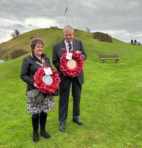 Bude Inner Wheel president Mandy Hamley and Rotary president Alan Rainsley preparing to lay wreaths at the War Memorial in Bude on Remembrance Sunday