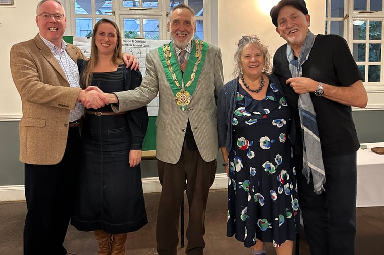 The winning team congratulated by the Area Chief Ranger