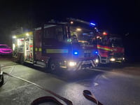 Fire crews rescue trapped driver