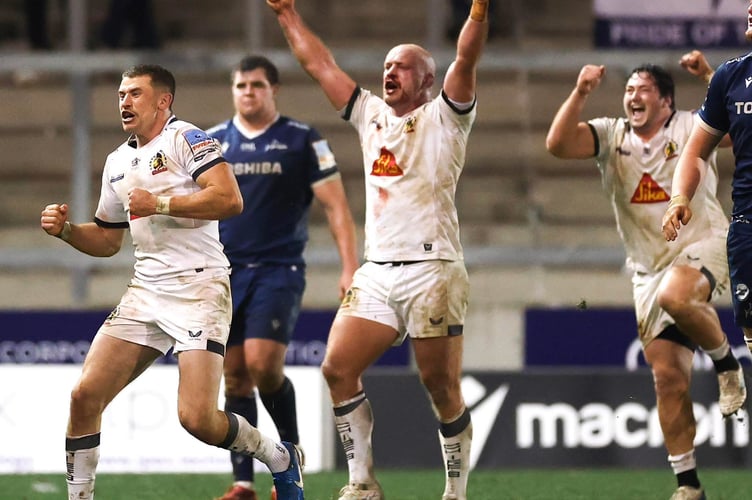 Exeter Chiefs players Harvey Skinner, Jack Yeandle and Bachuki Tchumbadze celebrate their side's victory at Sale Sharks