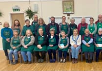 Star guest joins villagers to mark five years of community shop