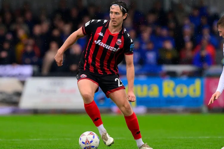 Truro City have completed the permanent signing of defender Shaun Donnellan from Livingston