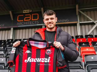 Tinners sign striker Stretton to aid survival bid