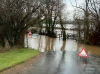 Launceston firefighters rescue car stranded in flooding