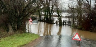 Launceston firefighters rescue car stranded in flooding