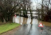 Launceston firefighters rescue car stranded in flooding