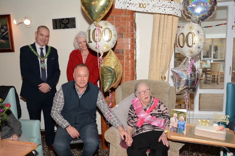 Cllr Jon Hutchings joining in the celebrations of Ruby Campion as she turned 100 (Picture: Rodney Parrish)