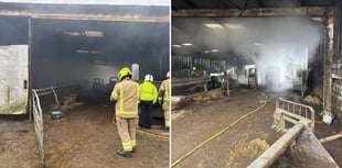 Firefighters tackle machinery blaze in barn
