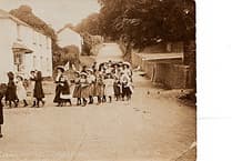 Looking Back: Can our readers name the "ladies and children in lovely hats"