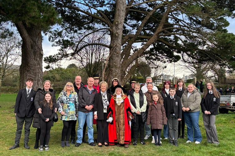 Cllr Liz Ahearn, mayor of Bodmin pictured with members of Nick Prideaux's family in front of the cherry tree dedicated to him. (Picture: Bodmin Town Council)