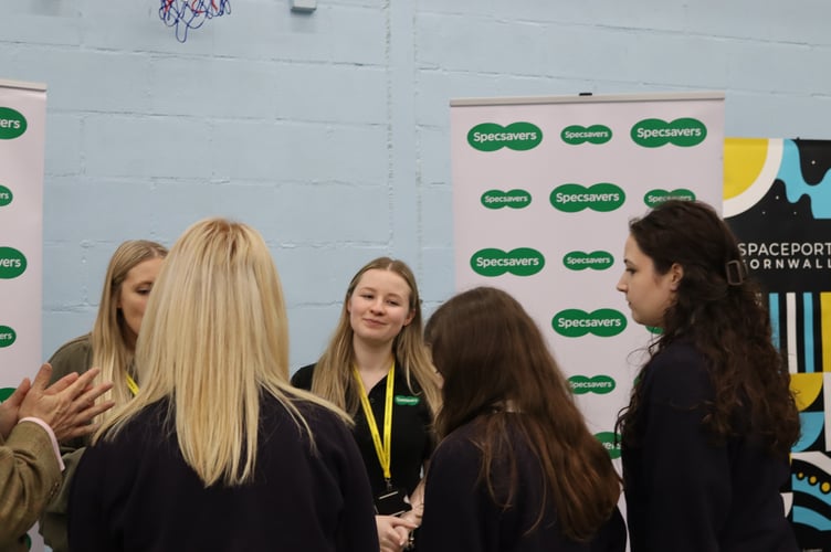 Students chat with the Specsavers team at the Launceston College careers fair