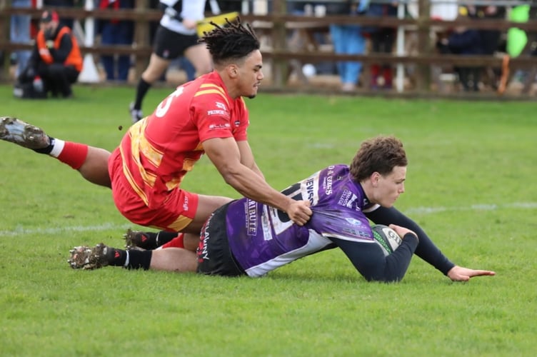 Cornish Pirates full-back Angus Mawson dives over for his try in their Championship victory over Cambridge