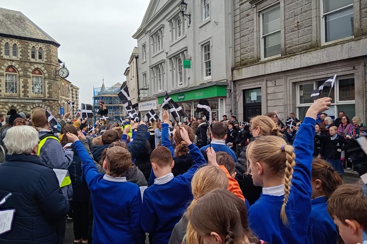 Flags were waved vigorously as all in the town Square joined in for 'Trelawny' 