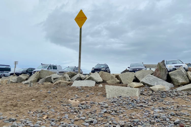 A sign marking where the underwater communication cables come ashore at Widemouth Bay near Bude. (Picture: Andrew Townsend)