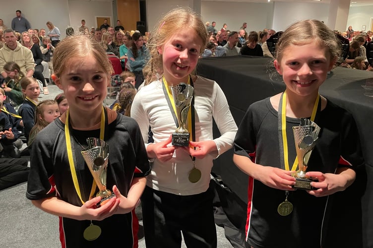 Year 3/4 Girls: Bishop Cornish's Mille O'Brien (centre) alongside the Stoke Climsland pair of Amelia Mullard and Lottie Gorman