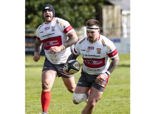 Camborne ease to victory to close in on league title