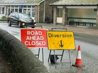 Mayor calls for business signs
