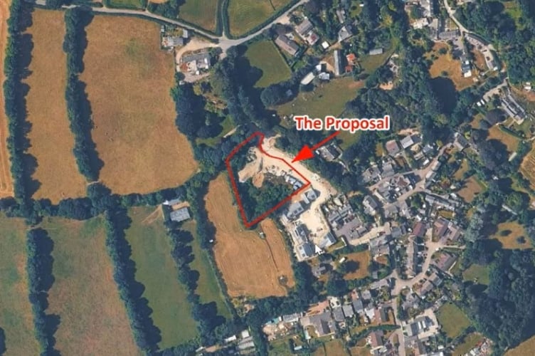 Where the houses would be built in relation to the village of Metherell