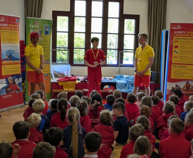 RNLI lifeguards provide pupils with water safety advice
