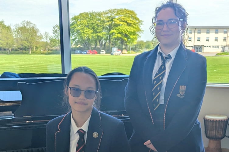 Grade 8 Distinction for Dolly and Cherrie (Picture: Shebbear College)