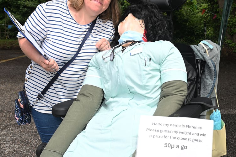 Amy with guess the weight of Florence